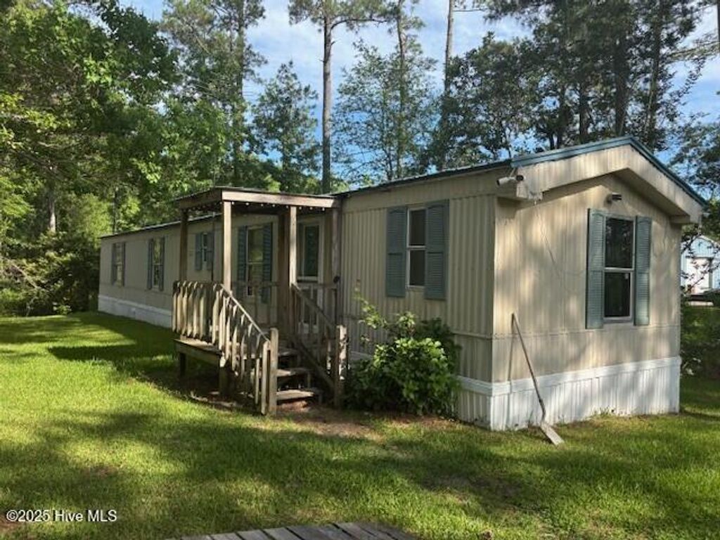 Photo of 212 Whispering Pines Court, Hampstead, NC 28443 (MLS # 100526392)