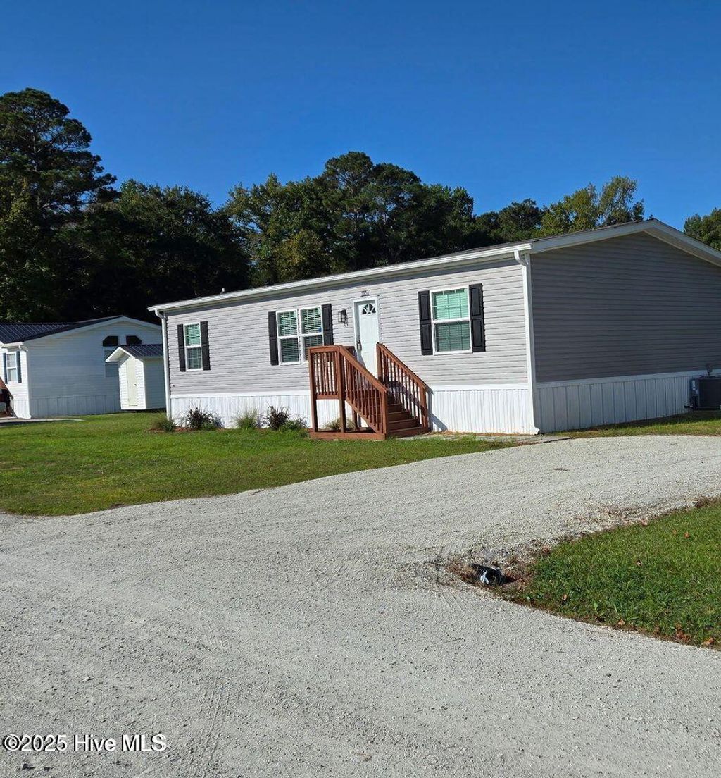 Photo of 1118 Old Tar Landing Road, Jacksonville, NC 28540 (MLS # 100526160)