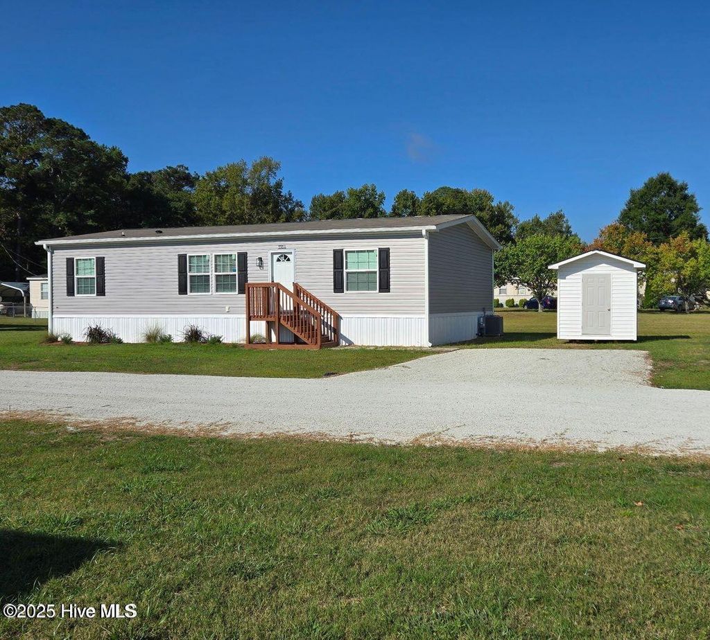 Photo of 1118 Old Tar Landing Road, Jacksonville, NC 28540 (MLS # 100526160)