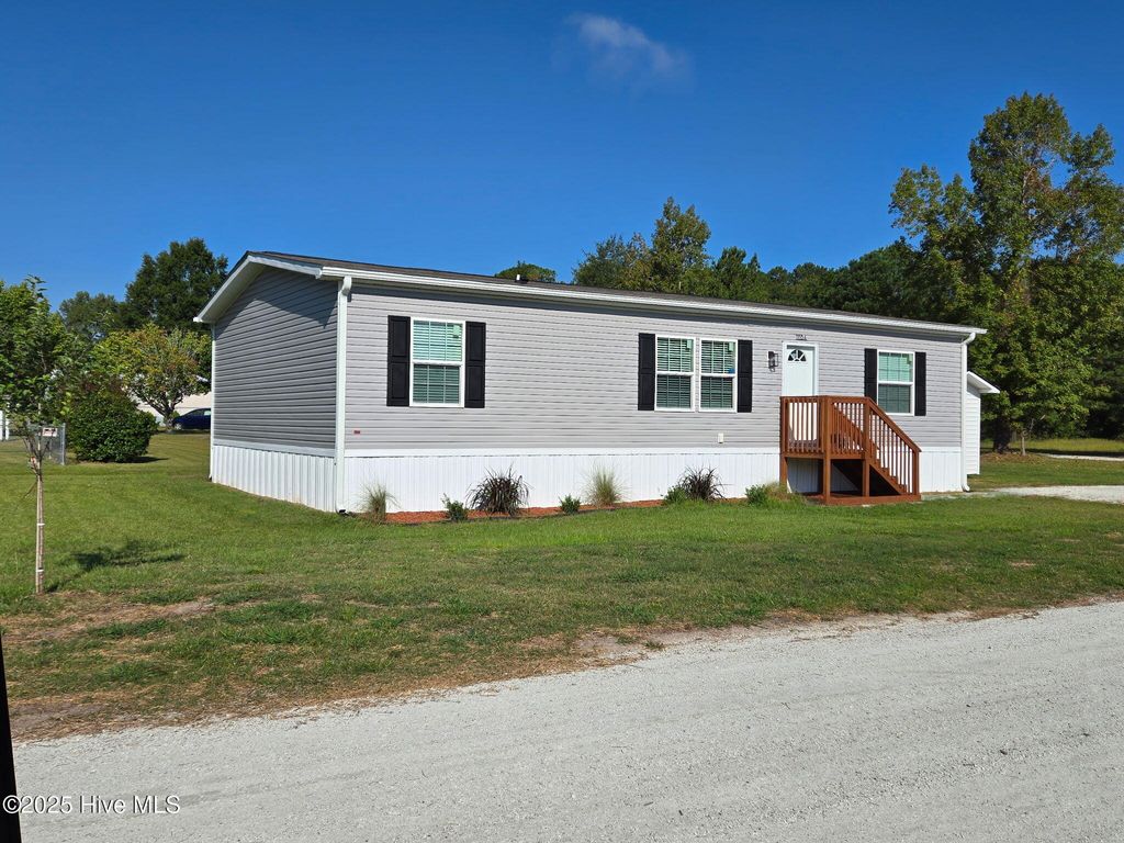 Photo of 1118 Old Tar Landing Road, Jacksonville, NC 28540 (MLS # 100526160)