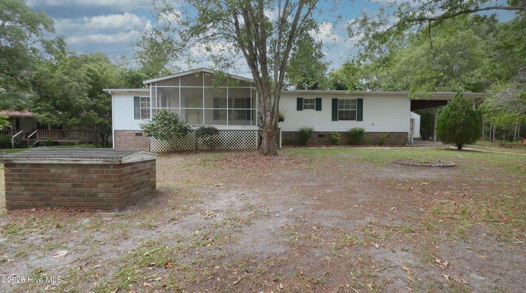Photo of 5167 Hummingbird Drive SW, Shallotte, NC 28470 (MLS # 100512426)