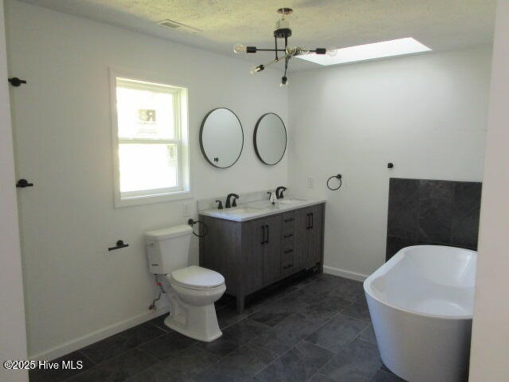 Photo of 3310 Mt Misery Road NE, Leland, NC 28451 (MLS # 100537588)