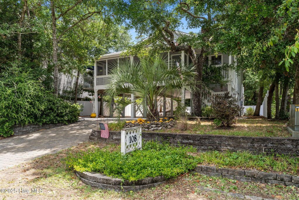 Photo of 108 SW 28th Street, Oak Island, NC 28465 (MLS # 100521042)