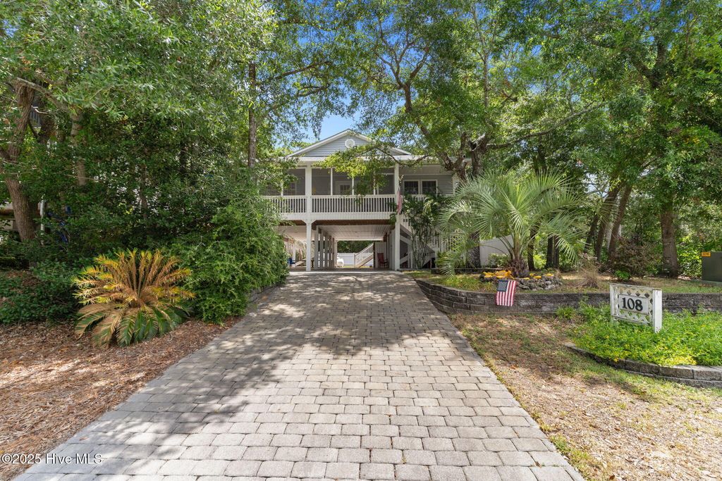 Photo of 108 SW 28th Street, Oak Island, NC 28465 (MLS # 100521042)