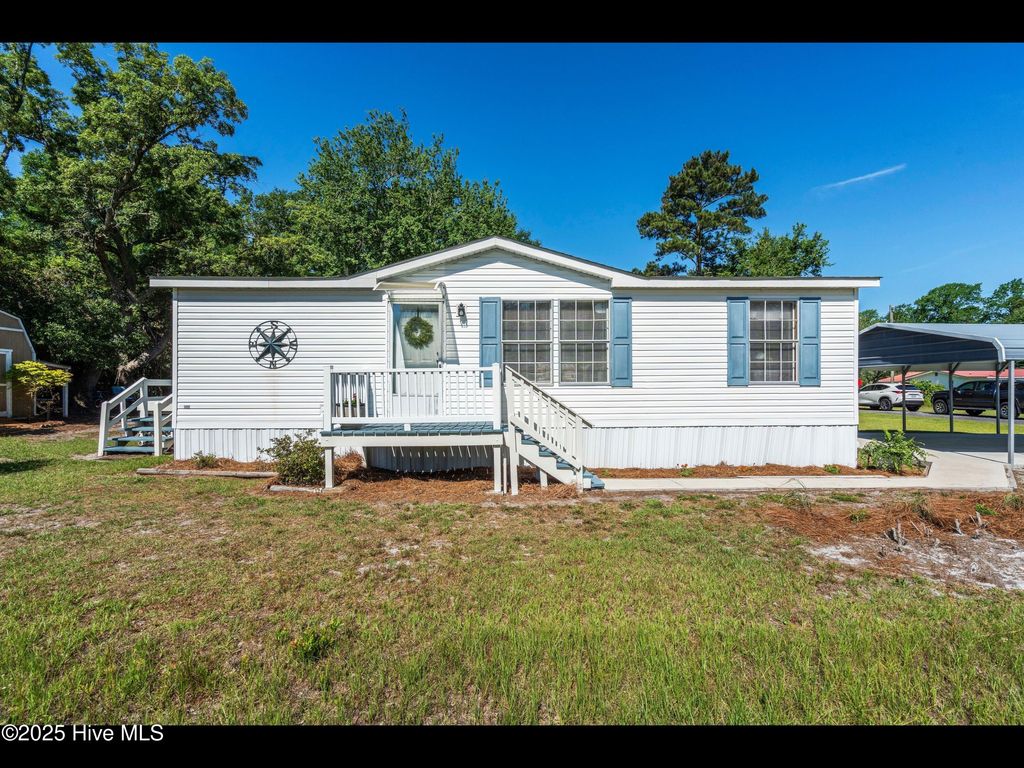 Photo of 6883 Eastbrook Avenue SW, Ocean Isle Beach, NC 28469 (MLS # 100516812)