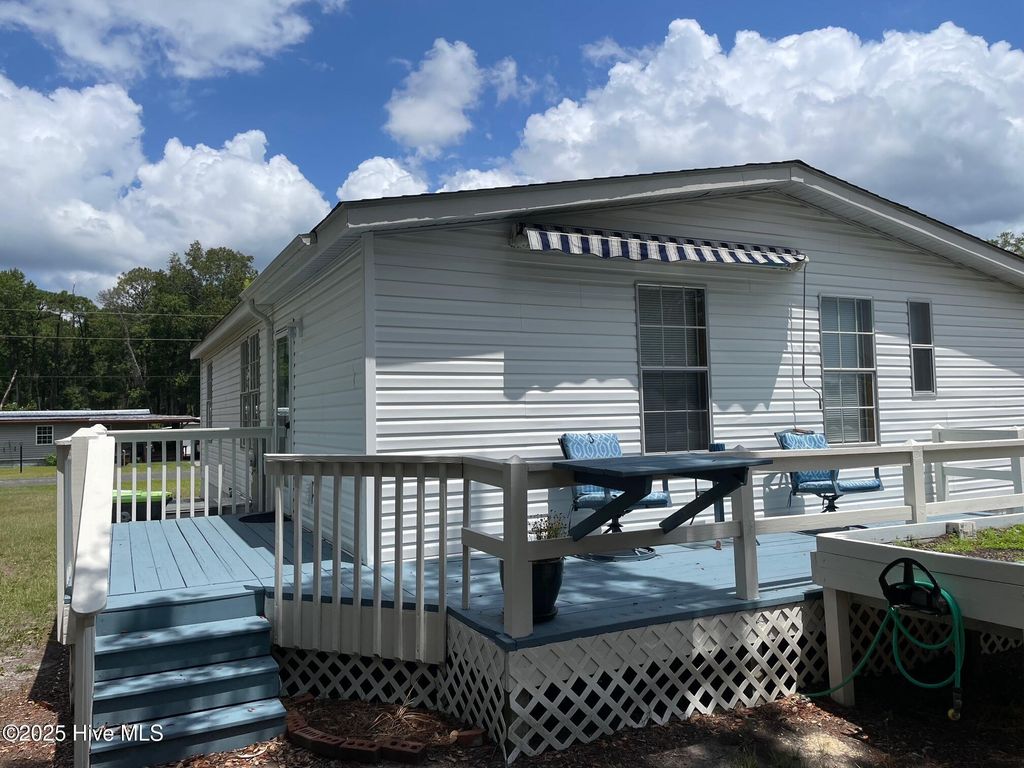 Photo of 6883 Eastbrook Avenue SW, Ocean Isle Beach, NC 28469 (MLS # 100516812)