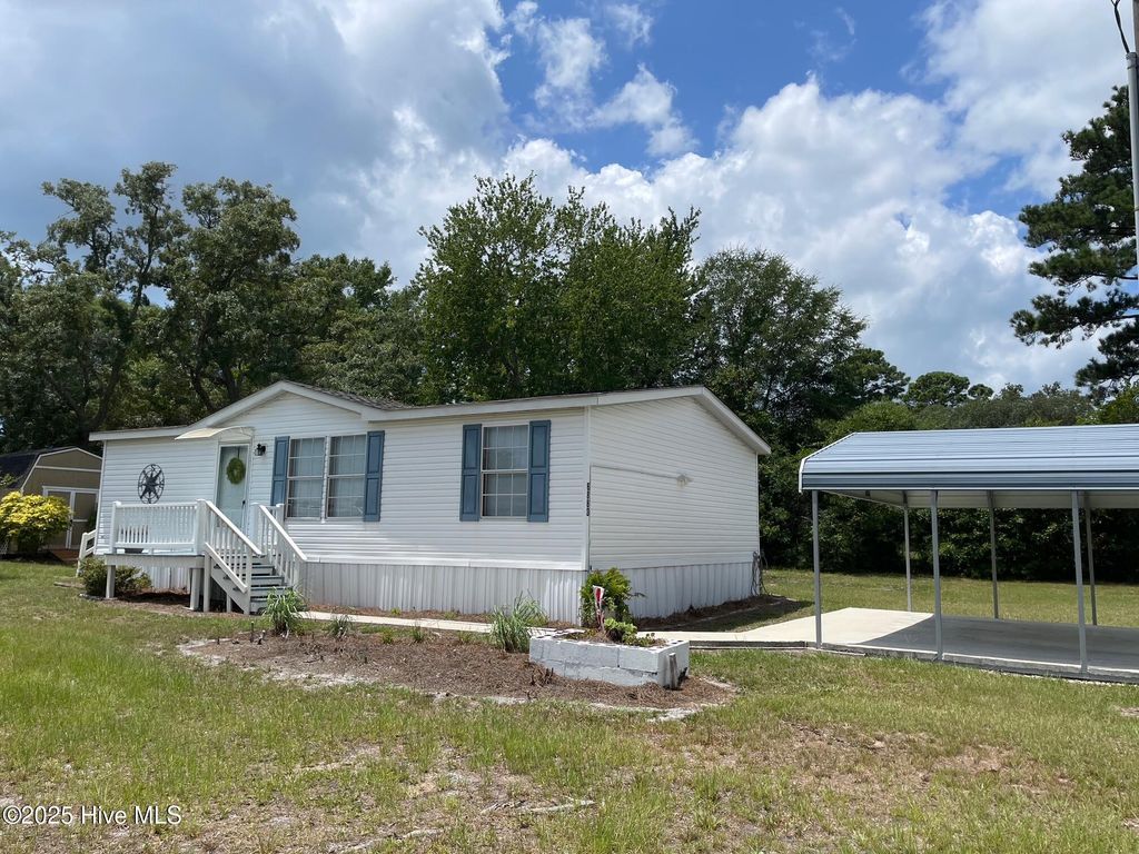 Photo of 6883 Eastbrook Avenue SW, Ocean Isle Beach, NC 28469 (MLS # 100516812)