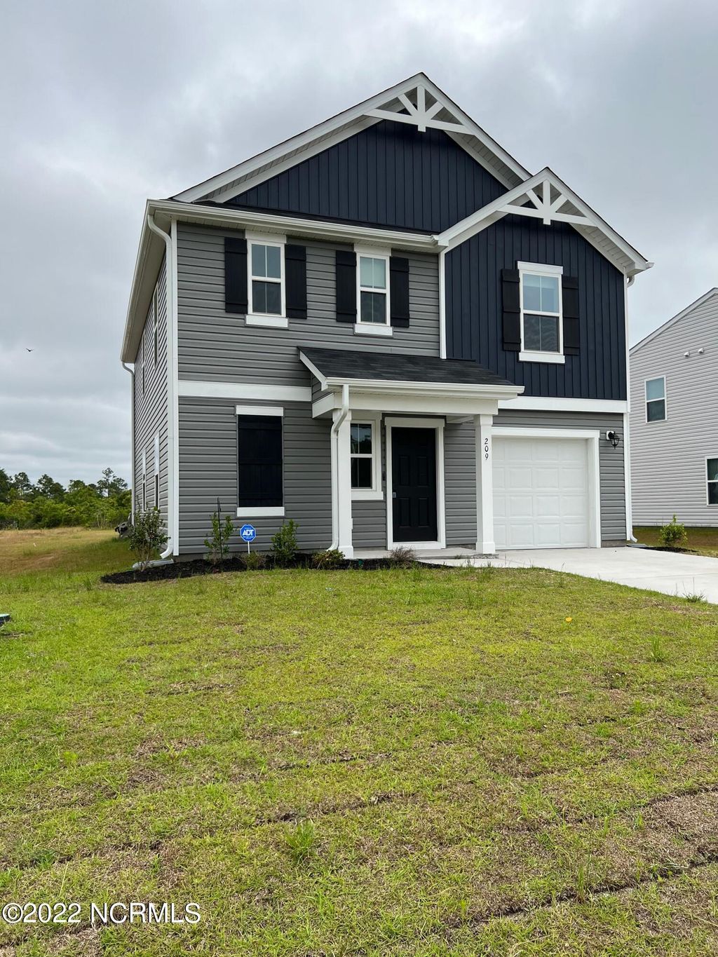 Photo of 209 New Home Place, Holly Ridge, NC 28445 (MLS # 100543951)