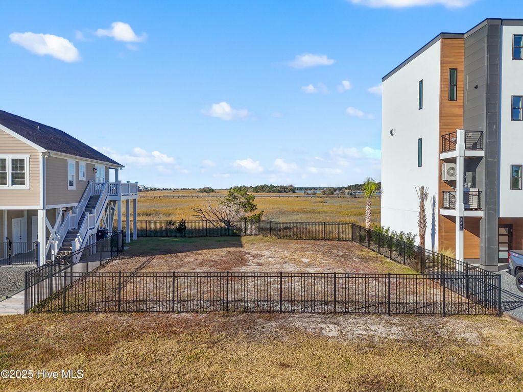 Photo of 141 Seagull Drive, Holden Beach, NC 28462 (MLS # 100541978)