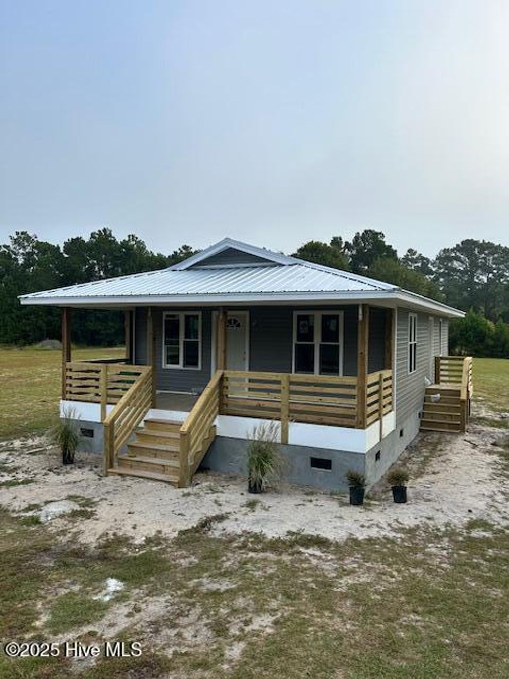 Photo of 431 Morris Landing Road, Holly Ridge, NC 28445 (MLS # 100533322)