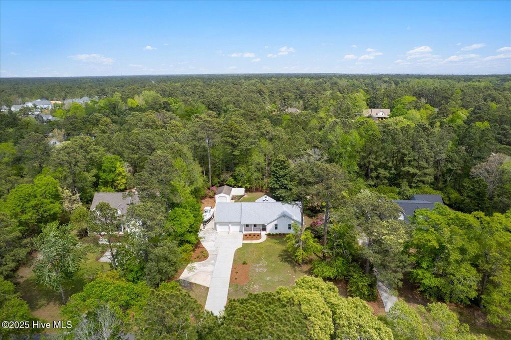 Photo of 709 Saw Grass Road, Hampstead, NC 28443 (MLS # 100500123)