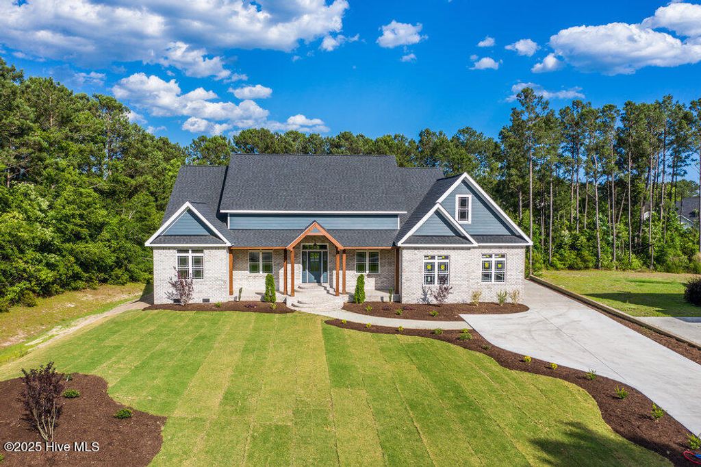 Photo of 406 Compass Point, Hampstead, NC 28443 (MLS # 100509859)