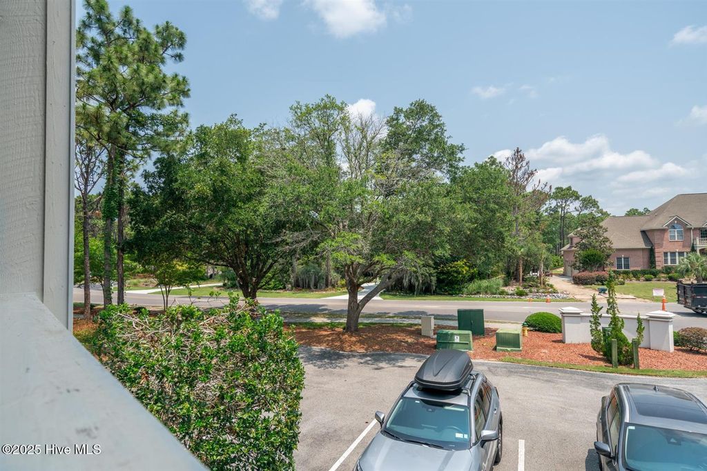 Photo of 3350 Club Villas Drive #104, Southport, NC 28461 (MLS # 100513341)
