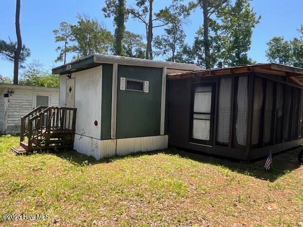 Photo of 254 NE 66th Street, Oak Island, NC 28465 (MLS # 100516132)