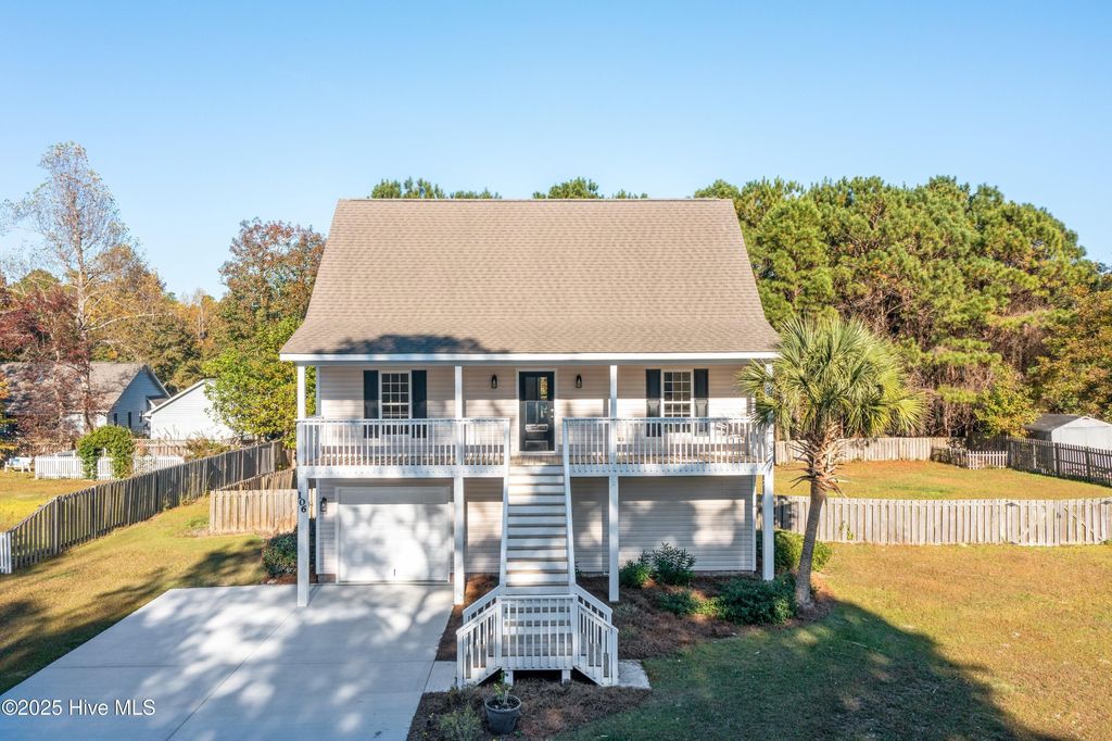 Photo of 106 Dolphin Drive, Hampstead, NC 28443 (MLS # 100540985)