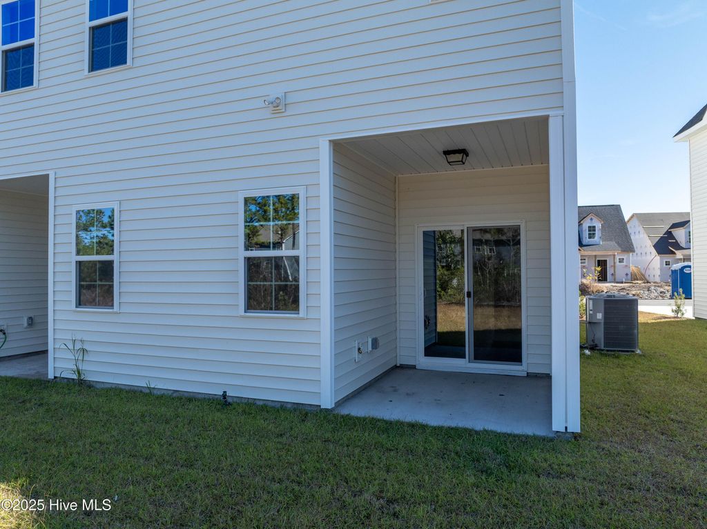 Photo of 218 Sandpiper Place, Holly Ridge, NC 28445 (MLS # 100495059)