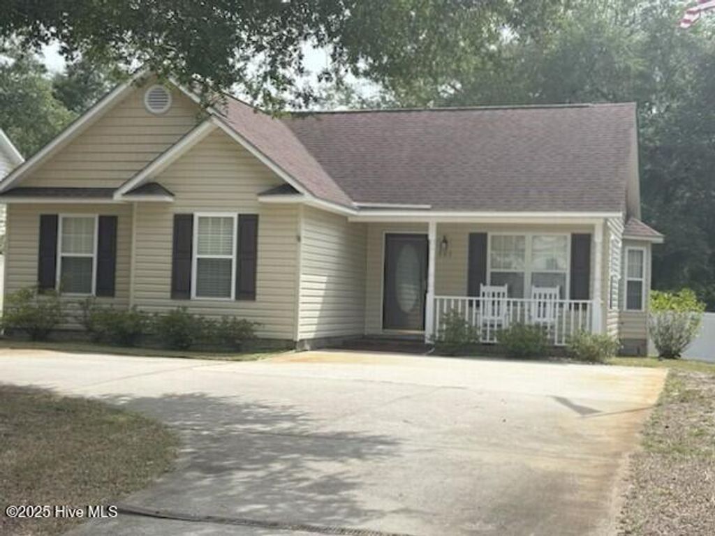 Photo of 803 W Oak Island Drive, Oak Island, NC 28465 (MLS # 100529926)
