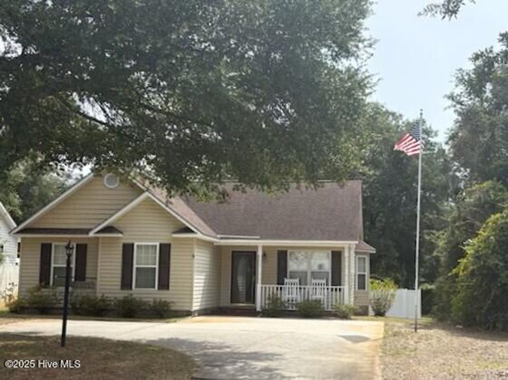 Photo of 803 W Oak Island Drive, Oak Island, NC 28465 (MLS # 100529926)