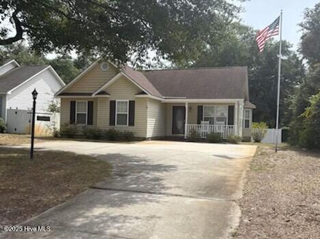 Photo of 803 W Oak Island Drive, Oak Island, NC 28465 (MLS # 100529926)