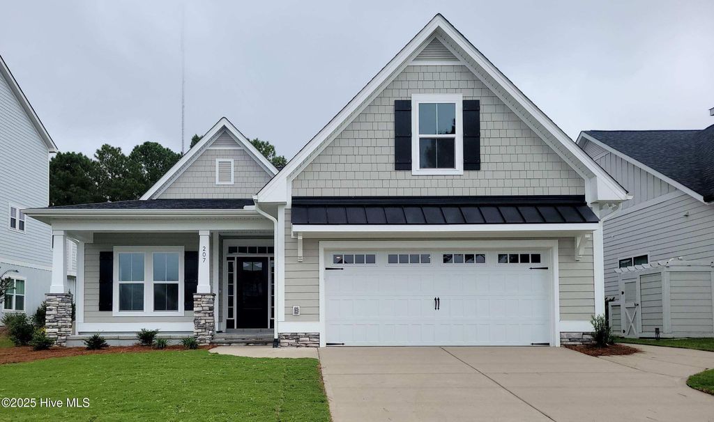 Photo of 207 Spicer Lake Drive, Holly Ridge, NC 28445 (MLS # 100533320)