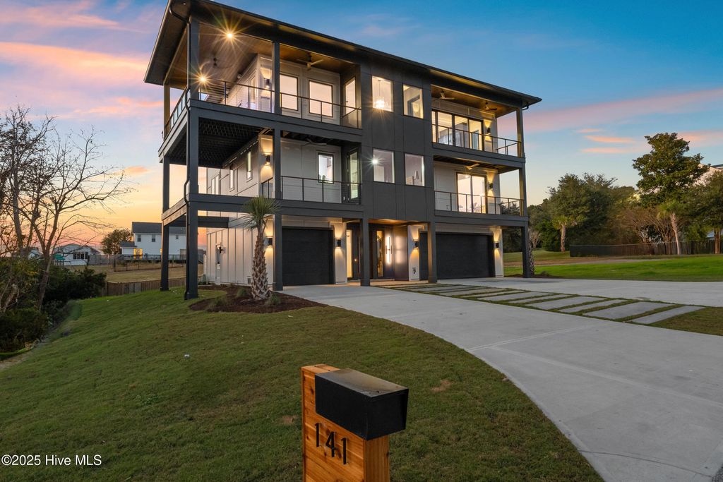 Photo of 141 Dogwood Lane, Hampstead, NC 28443 (MLS # 100541320)