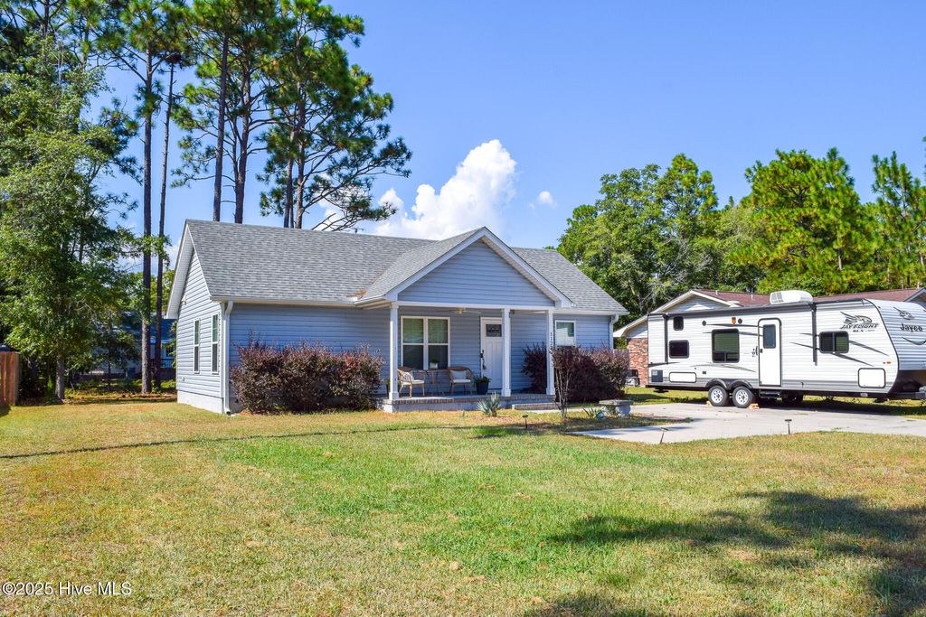 Photo of 1127 E Boiling Spring Road, Southport, NC 28461 (MLS # 100513955)