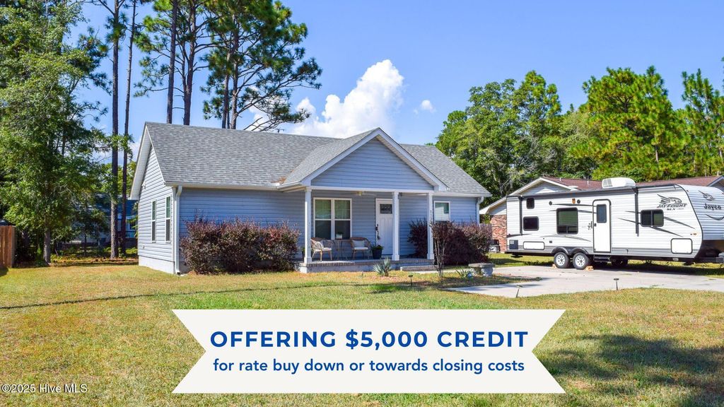 Photo of 1127 E Boiling Spring Road, Southport, NC 28461 (MLS # 100513955)