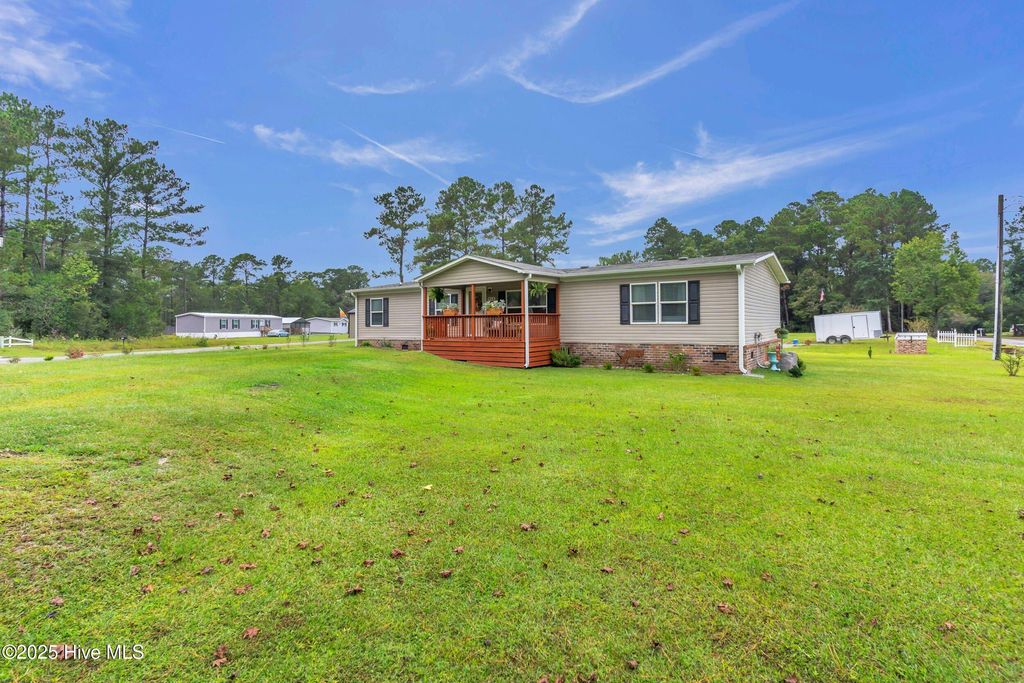 Photo of 414 Sherrow River Drive SW, Shallotte, NC 28470 (MLS # 100533753)