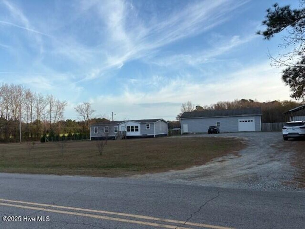 Photo of 7057 Wiggins Mill Road, Lucama, NC 27851 (MLS # 100543489)