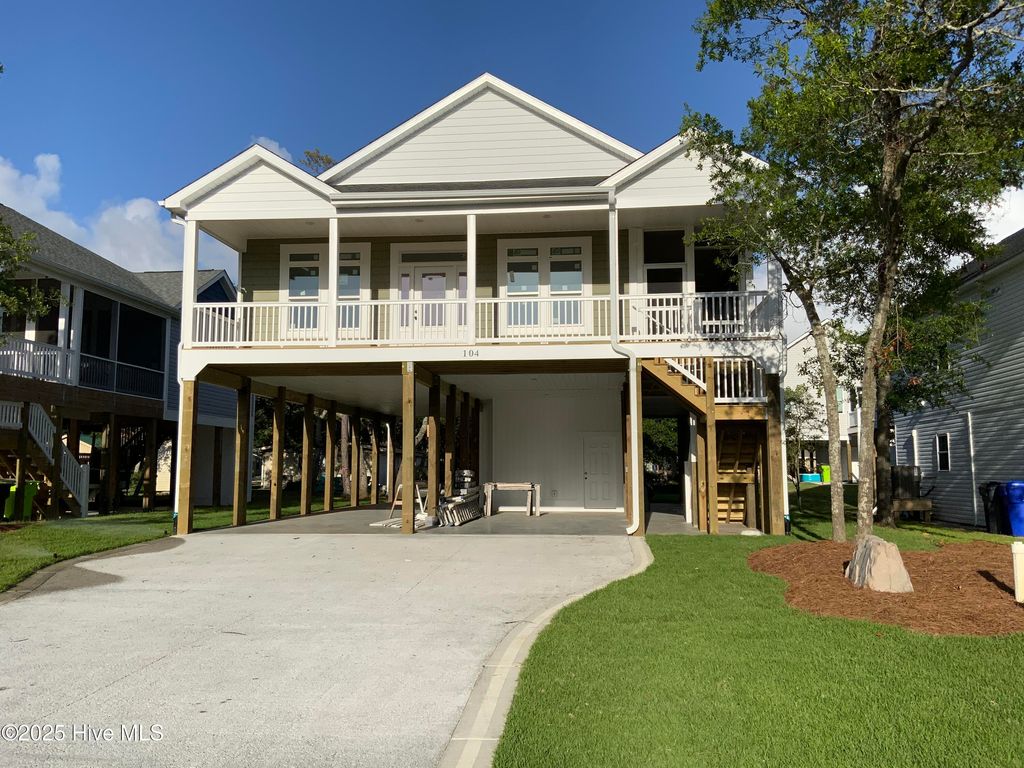 Photo of 104 NE 52nd Street, Oak Island, NC 28465 (MLS # 100517415)