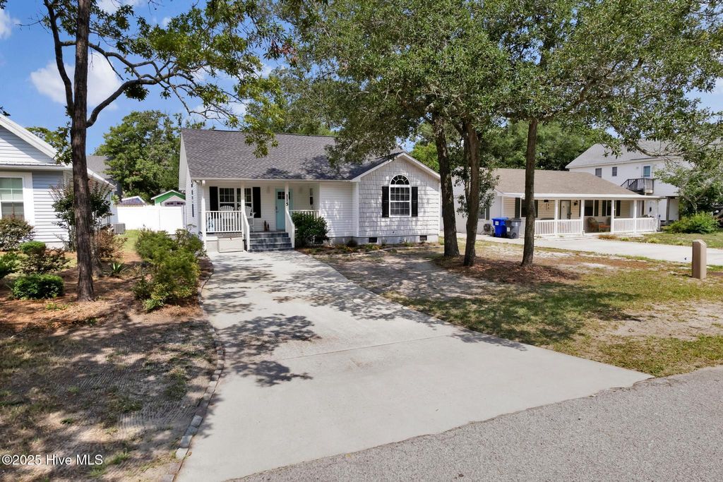 Photo of 115 NE 29th Street, Oak Island, NC 28465 (MLS # 100511597)
