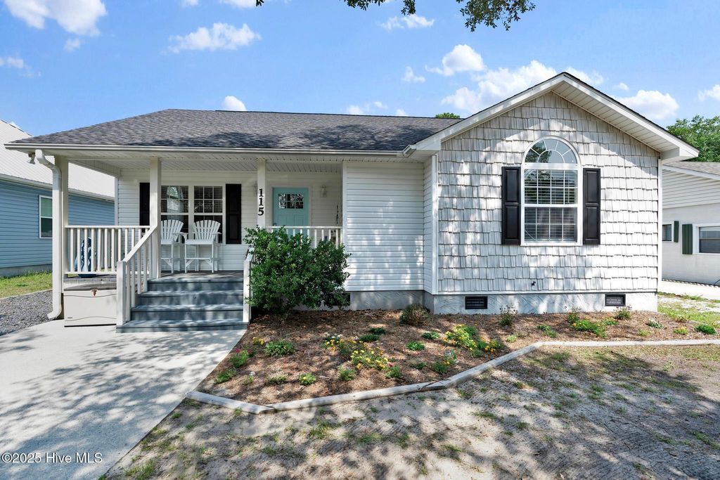 Photo of 115 NE 29th Street, Oak Island, NC 28465 (MLS # 100511597)