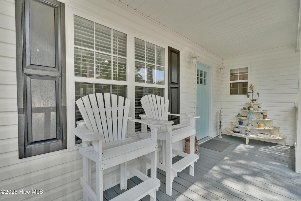 Photo of 115 NE 29th Street, Oak Island, NC 28465 (MLS # 100511597)