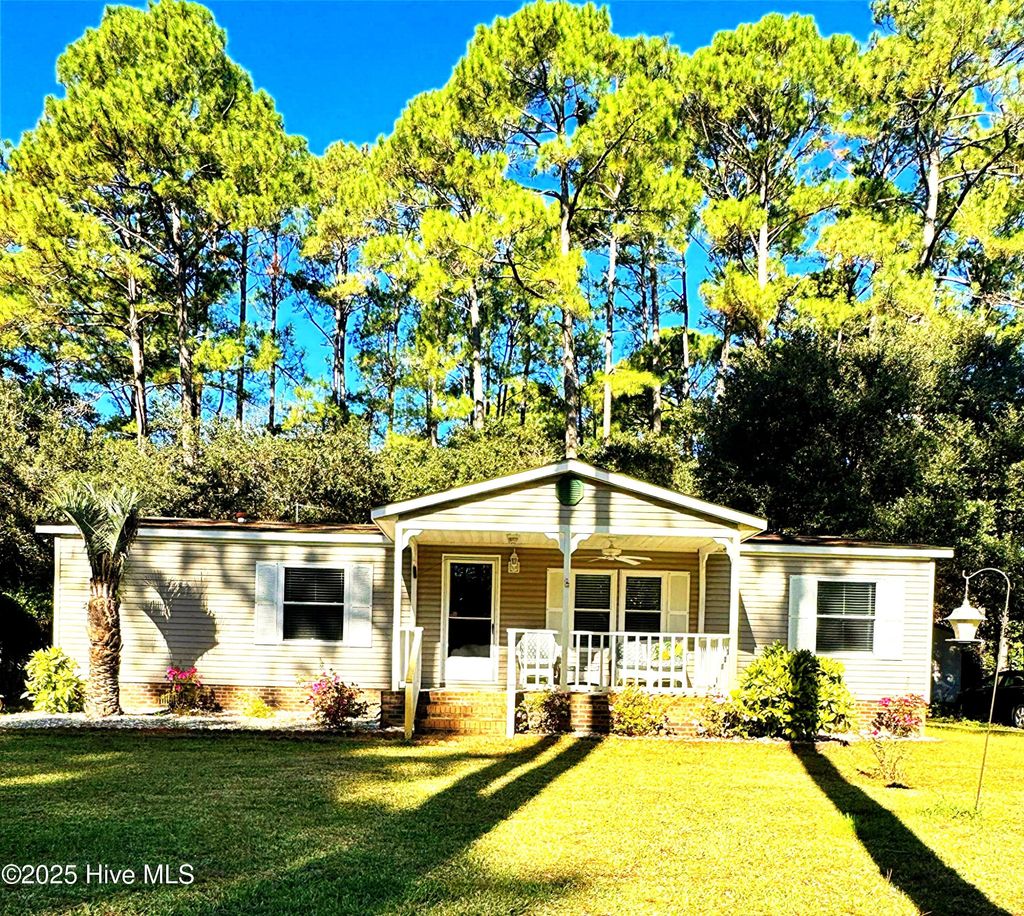 Photo of 211 Beachwood Drive NW, Calabash, NC 28467 (MLS # 100538236)