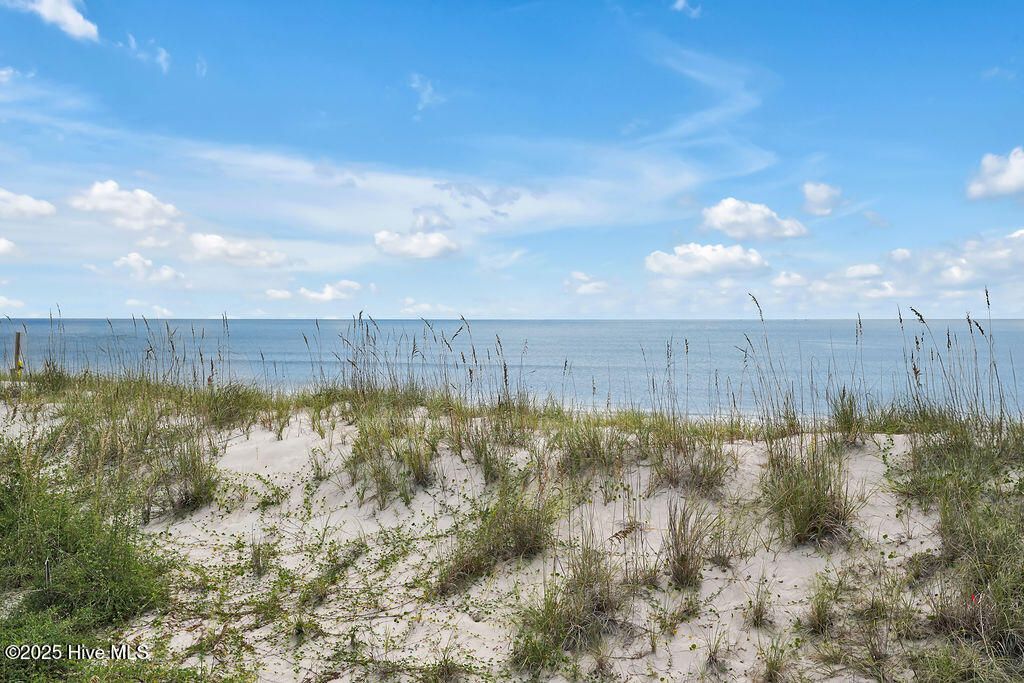 Photo of 5227 E Beach Drive, Oak Island, NC 28465 (MLS # 100530284)