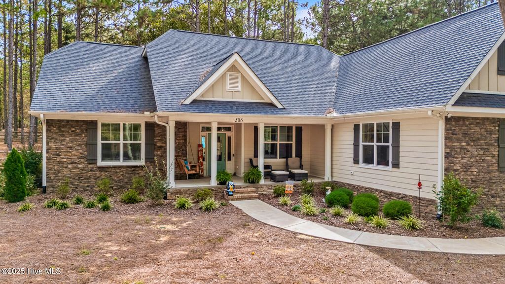 Photo of 506 Longleaf Drive, West End, NC 27376 (MLS # 100535770)