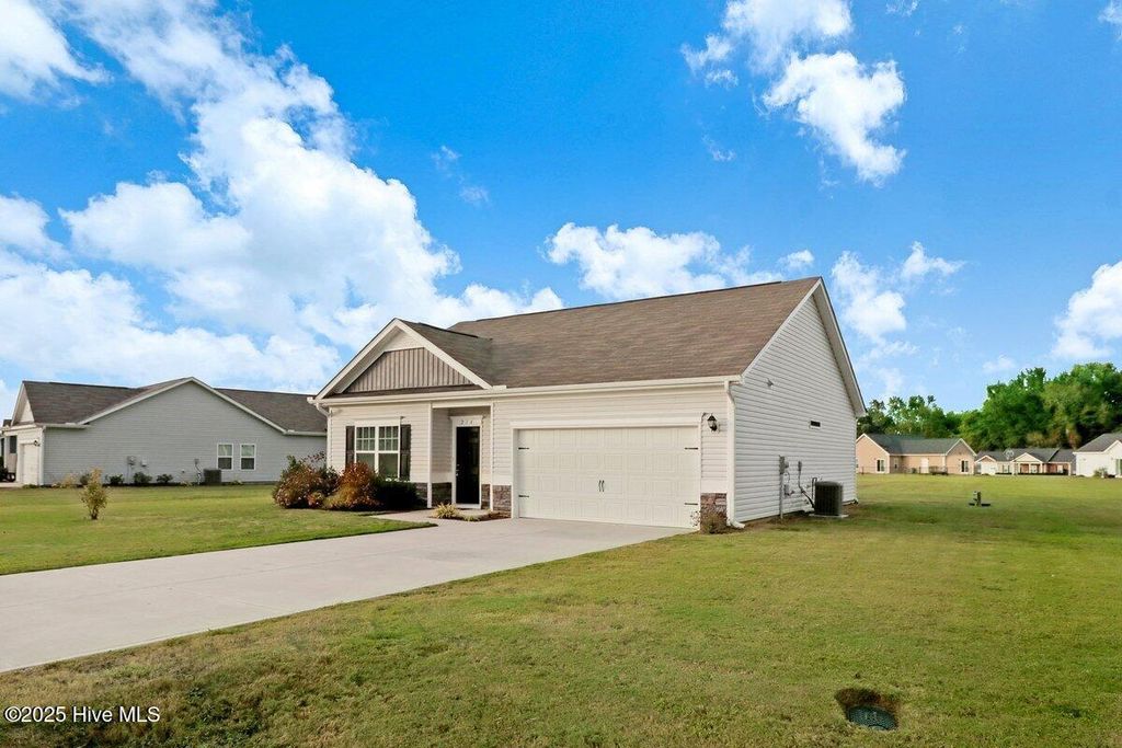 Photo of 214 Settlers Pointe Drive, Pikeville, NC 27863 (MLS # 100536354)