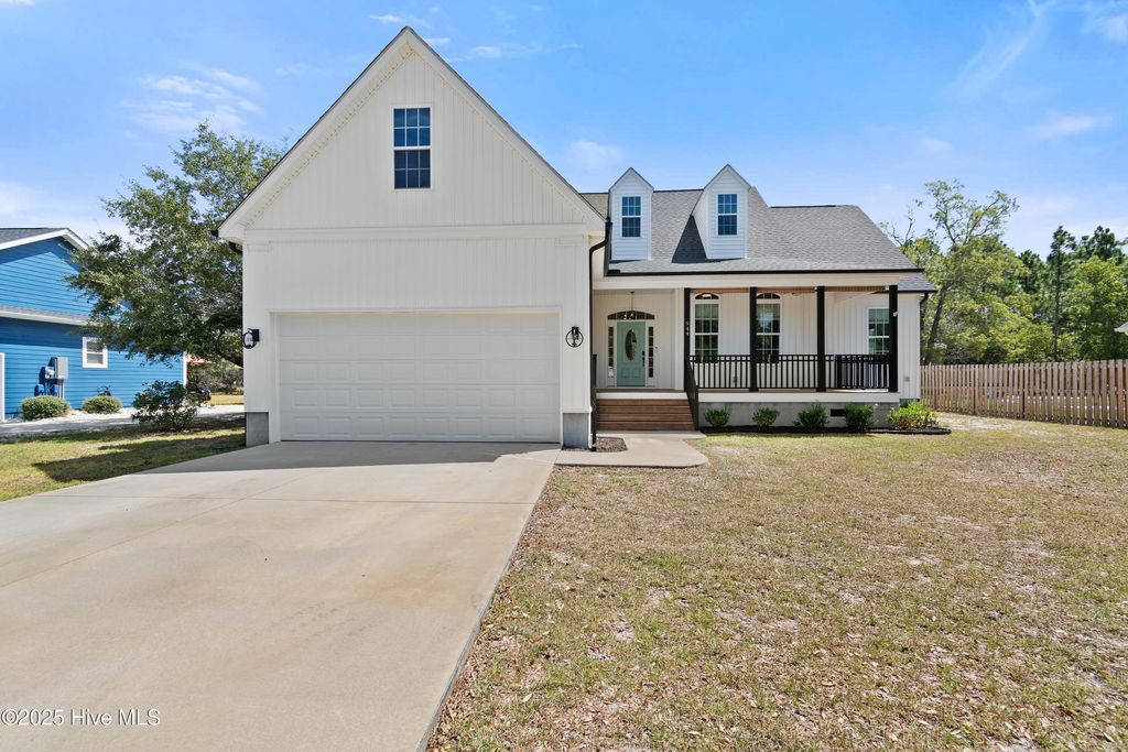 Photo of 944 Nicklaus Road, Southport, NC 28461 (MLS # 100528661)