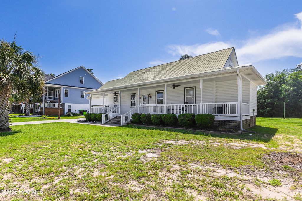 Photo of 321 NE 60th Street, Oak Island, NC 28465 (MLS # 100536488)