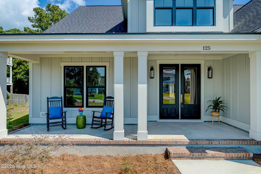 Photo of 125 Cove Side Lane, Hampstead, NC 28443 (MLS # 100526920)