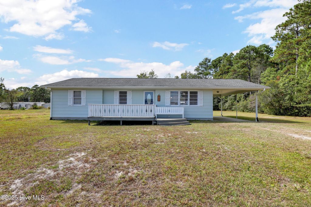 Photo of 767 E Ocean Road, Holly Ridge, NC 28445 (MLS # 100533401)