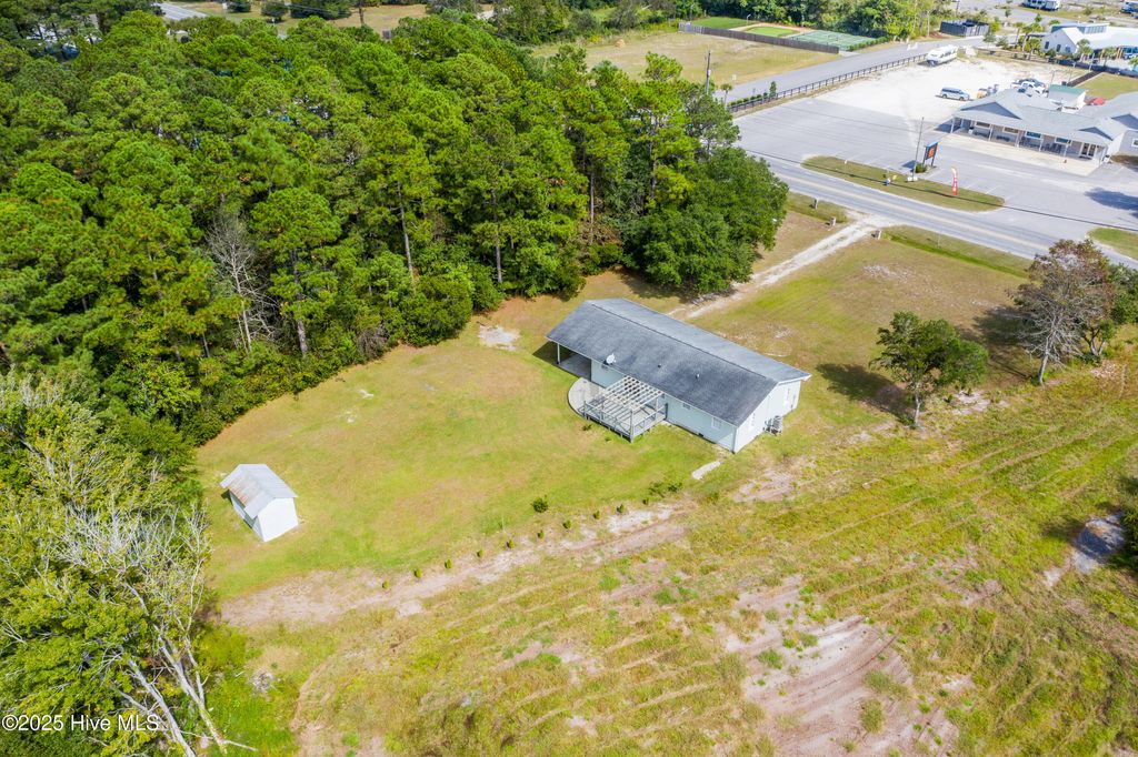 Photo of 767 E Ocean Road, Holly Ridge, NC 28445 (MLS # 100533401)