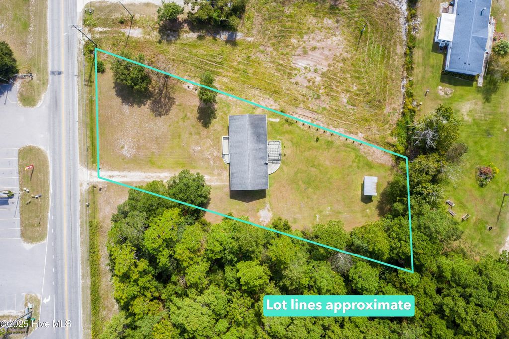 Photo of 767 E Ocean Road, Holly Ridge, NC 28445 (MLS # 100533401)