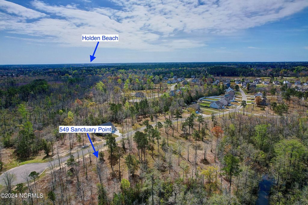Photo of 549 Sanctuary Point SW, Supply, NC 28462 (MLS # 100434821)