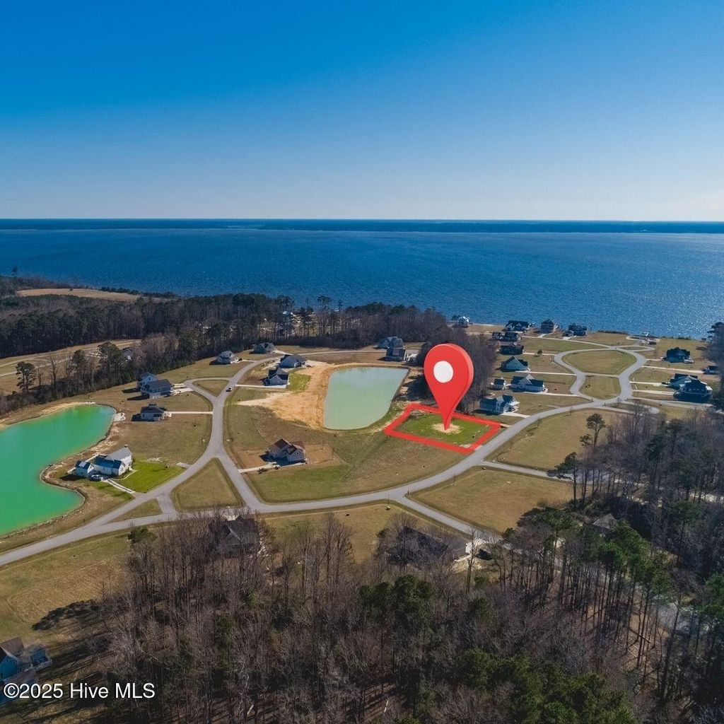 Photo of 727 W Burton Farm Drive, Minnesott Beach, NC 28510 (MLS # 100534596)