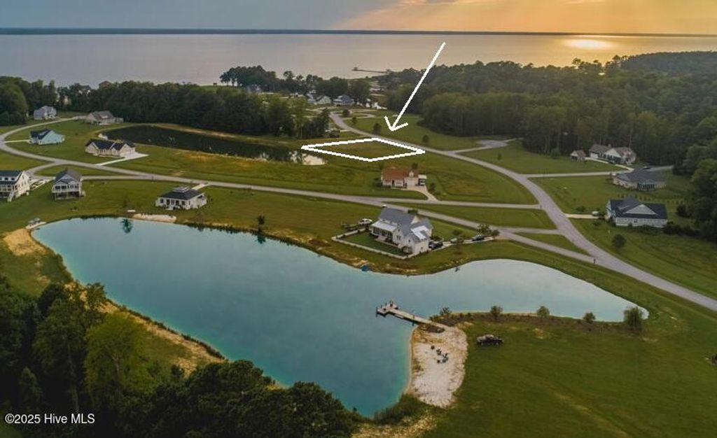 Photo of 727 W Burton Farm Drive, Minnesott Beach, NC 28510 (MLS # 100534596)