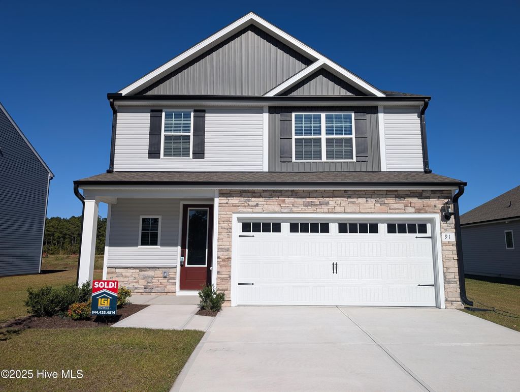 Photo of 91 S Umbrella Palm Drive, Hampstead, NC 28443 (MLS # 100541140)