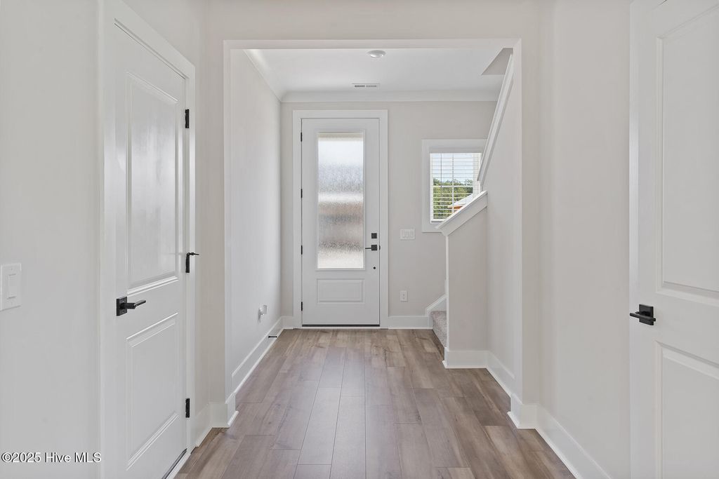 Photo of 91 S Umbrella Palm Drive, Hampstead, NC 28443 (MLS # 100541140)