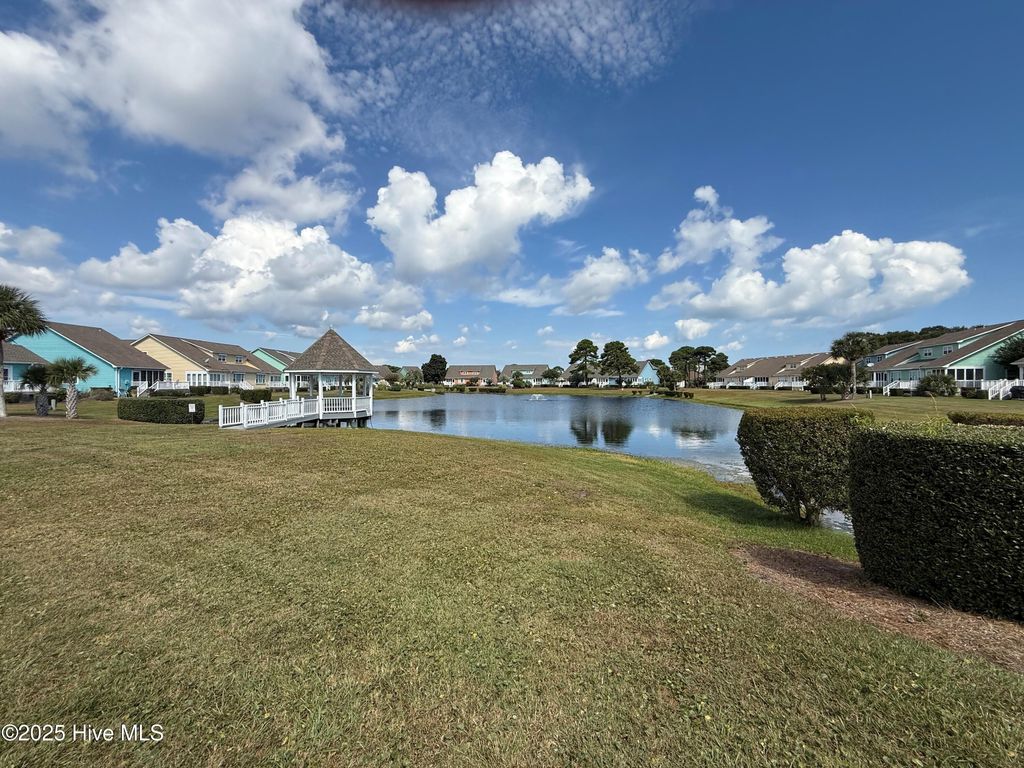 Photo of 601 Sloop Pointe Lane, Kure Beach, NC 28449 (MLS # 100532932)