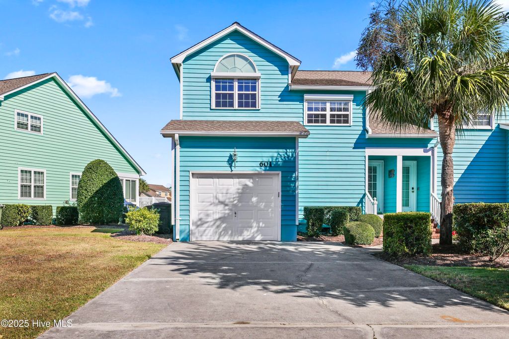 Photo of 601 Sloop Pointe Lane, Kure Beach, NC 28449 (MLS # 100532932)